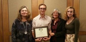 Daniel Hoffman pictured with his Students of the Month Award